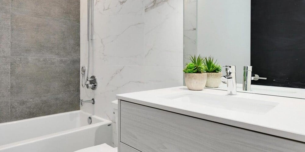 Bathroom Remodel with Modern Tiled Walls and Gray Wood Vanity in Chicago Suburbs