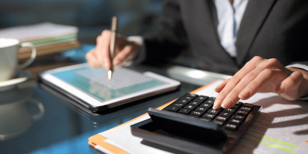 Stock Image of Person Doing Taxes