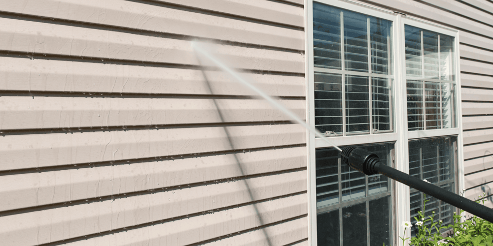 Stock Image of Power Washing a House