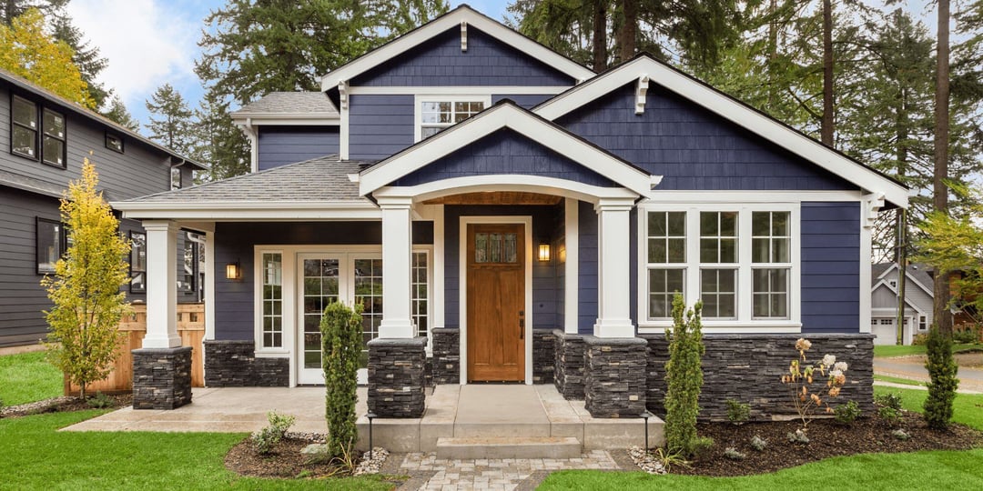 Stock Image of Home Exterior with New Windows and Siding