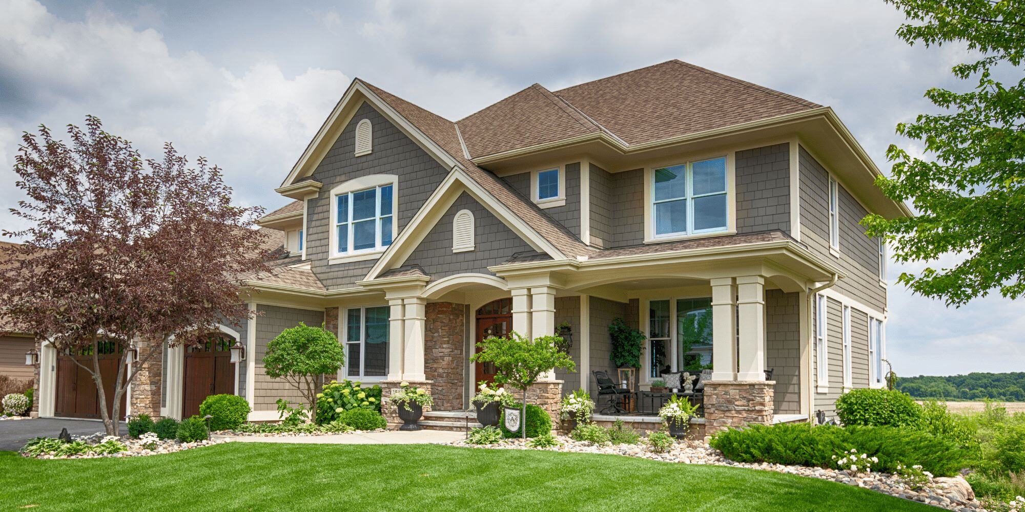 Two Tone Home Exterior Remodel with Columns and Porch