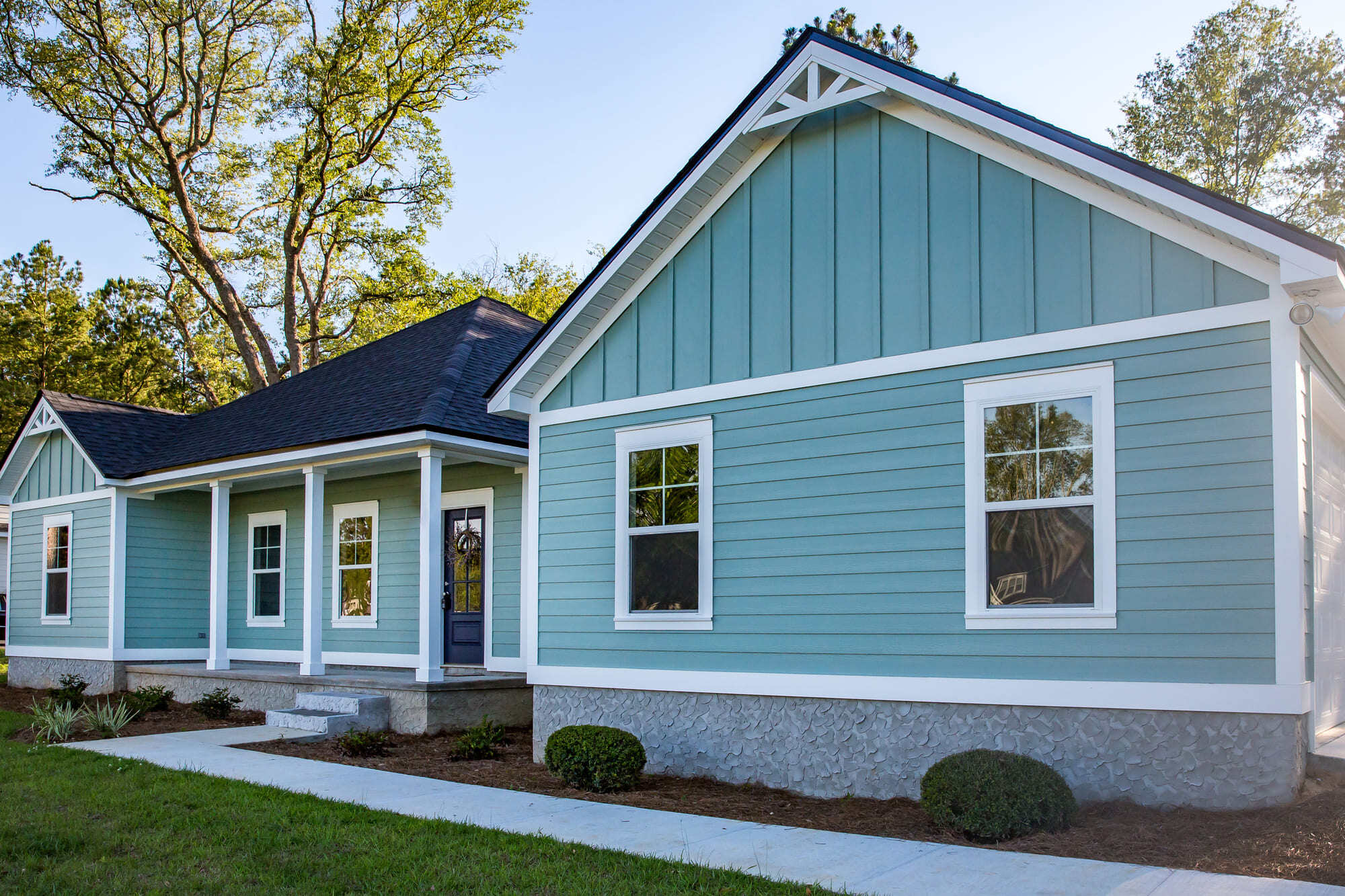 Stock Image of Remodeled Exterior of Home with New Windows