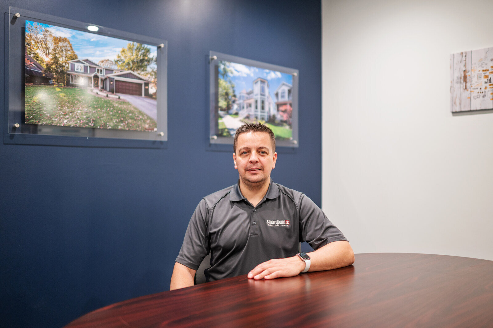 marek headshot sitting at table smardbuild chicago remodeler