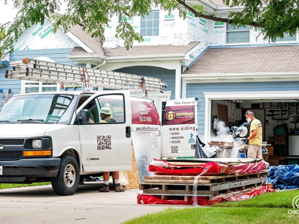 smardbuild van outside of house working on exterior in chicago-1