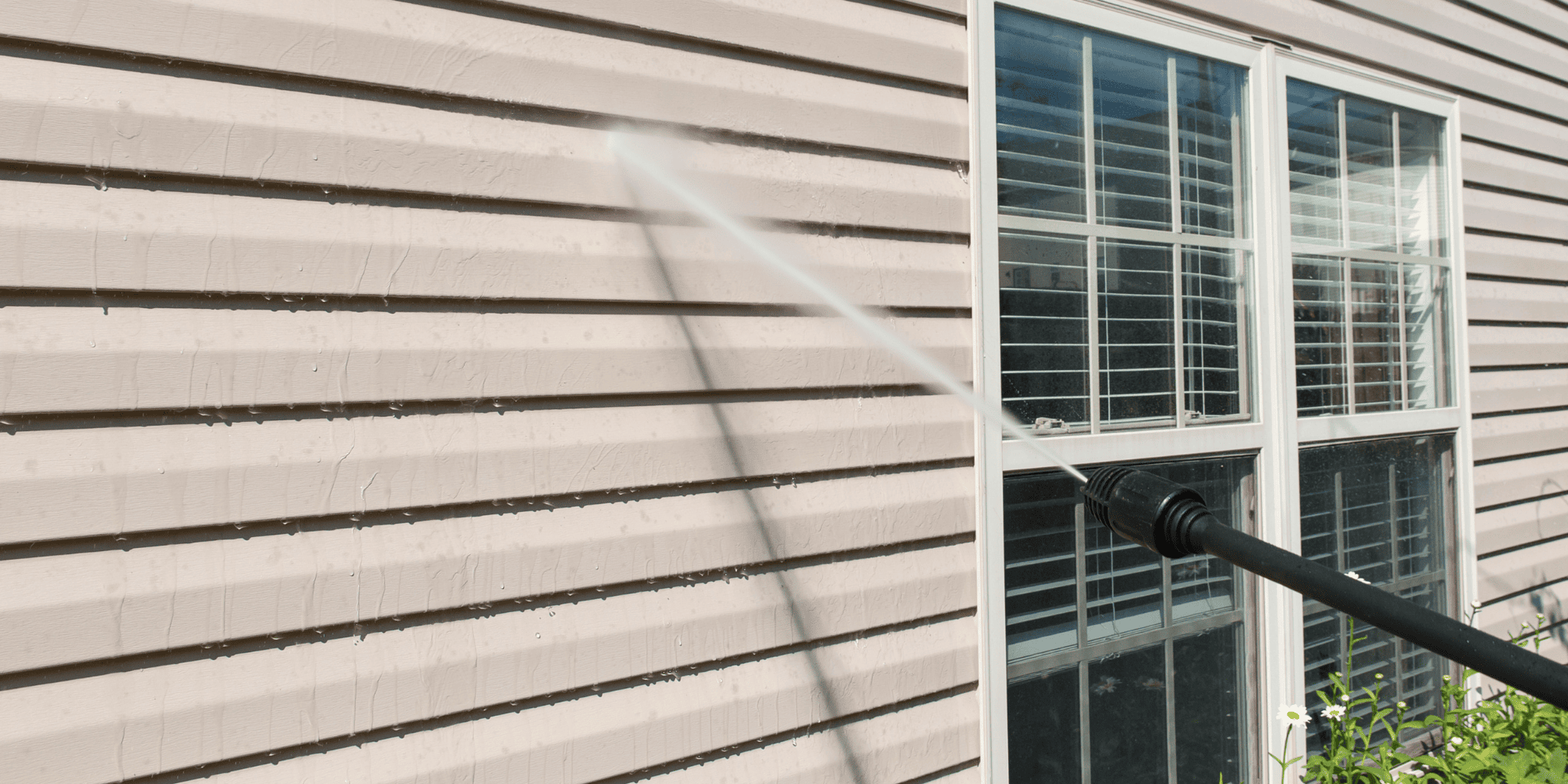 Stock Image of Power Washing a House