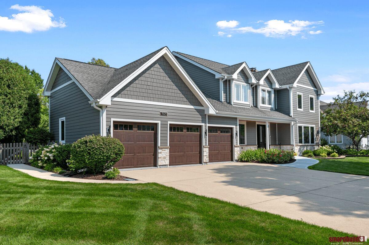 Exterior view of home with replaced gray siding in Naperville